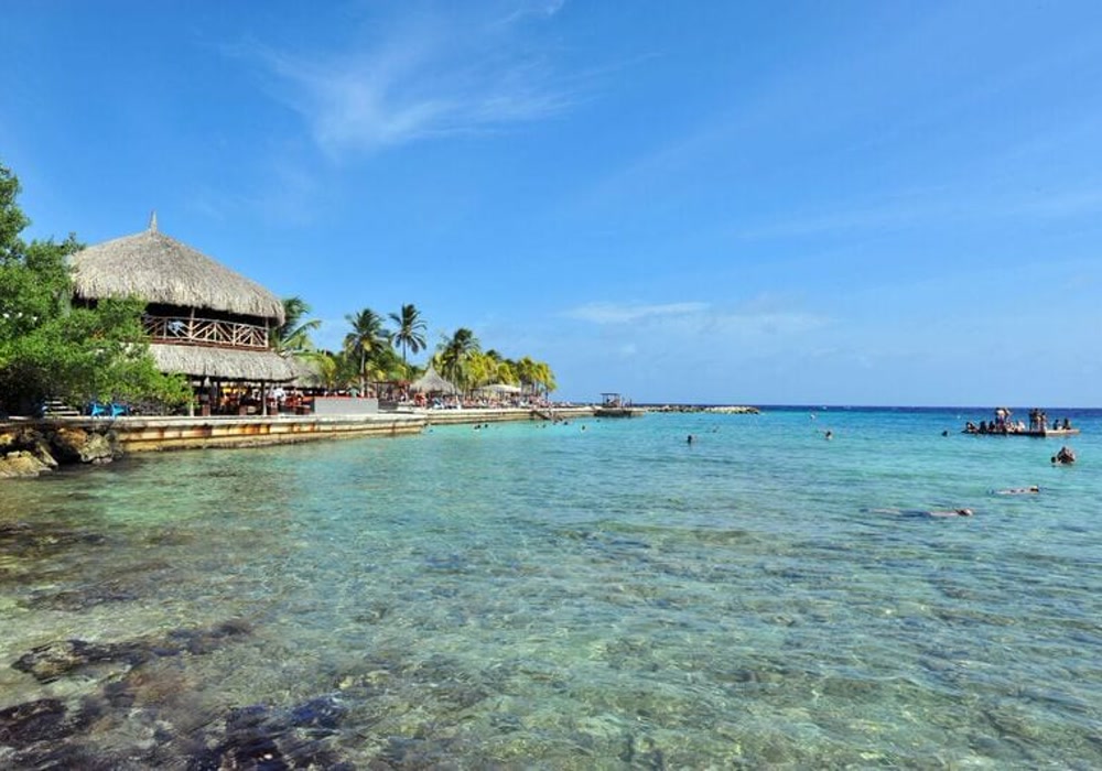 the turquoise water and shore at Jan Thiel Beach